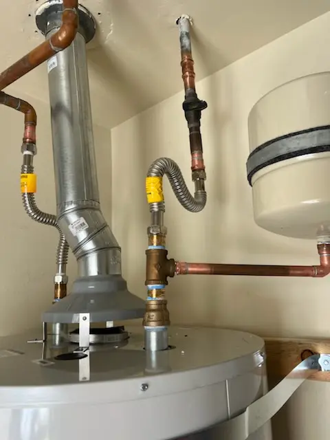 Water heater installation and plumbing repair in Curtis